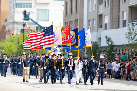 Indianapolis, Indiana, USA - May 25, 2019: Indy 500 Parade, Members of the United States military escorting the American flag down Pennsylvania Streetのeditorial素材