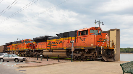 Cape Girardeau, Missouri, USA - August 29, 2020: Acargo train driving along the Mississippi river
