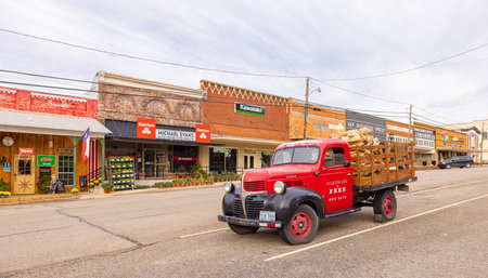 San Augustine, Texas, USA - October 17, 2021: The old business district on Columbia Street with an old dodge truck park on the streetのeditorial素材