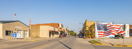 Oblong, Illinois, USA - September 28, 2021: The Old Business district along Main Street, with a large American Flag Muralのeditorial素材