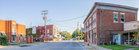 Robinson, Illinois, USA - September 28, 2021: The old shops at the Railroad crossing on Cross Streetのeditorial素材