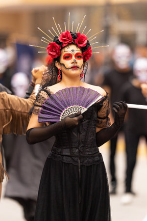 Matamoros, Tamaulipas, Mexico - November 1, 2022: Dia de los Muertos Parade, Young woman dress as...