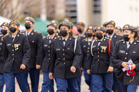 Laredo, Texas, USA - February 19, 2022: The Anheuser-Busch Washingtonâs Birthday Parade, Members of the Cigarroa H.S. Army JROTC Toro Battalion, marching in full military uniformsのeditorial素材