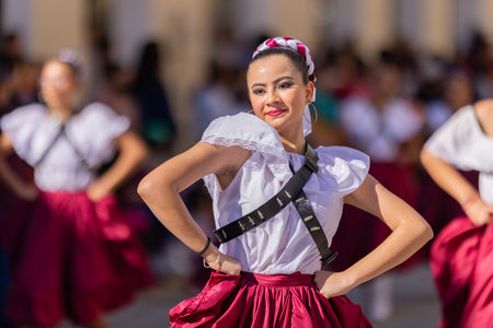 Matamoros, Tamaulipas, Mexico - November 26, 2022: The Desfile del 20 de Noviembre, Dancer wearing traditional clothing, dress up as adelita, performing at the paradeのeditorial素材