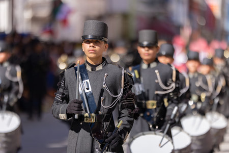Matamoros, Tamaulipas, Mexico - November 26, 2022: The Desfile del 20 de Noviembre, The Escuela Secundaria General No 2 Marching band performing at th eparadeのeditorial素材