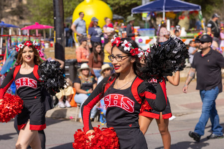 San Antonio, Texas, USA - April 8, 2022: The Battle of the Flowers Parade, The Southside High School Mighty Cardinal Band performing at the paradeのeditorial素材