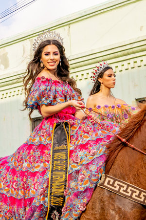 Matamoros, Tamaulipas, Mexico - February 25, 2023: Fiestas Mexicanas Parade, Beauty Queen wearing...