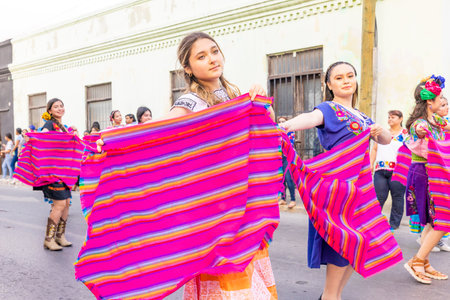 Matamoros, Tamaulipas, Mexico - February 25, 2023: Fiestas Mexicanas Parade, Students from the Villa Freinet Cultural School, wearing traditional clothing, performing a mexican danceのeditorial素材