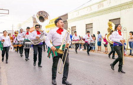 Matamoros, Tamaulipas, Mexico - February 25, 2023: Fiestas Mexicanas Parade, The Marching band from the TEC, performing at the paradeのeditorial素材