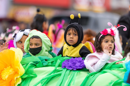 Valle Hermoso, Tamaulipas, Mexico - March 18, 2023: City Anniversary Parade, Children dress as animals on a float, to rise Nature preservation awarenessのeditorial素材