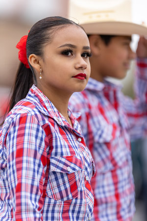 Valle Hermoso, Tamaulipas, Mexico - March 18, 2023: City Anniversary Parade, Dance Group from the Lic. Adolfo Lopez Mateos middle school performing at the paradeのeditorial素材
