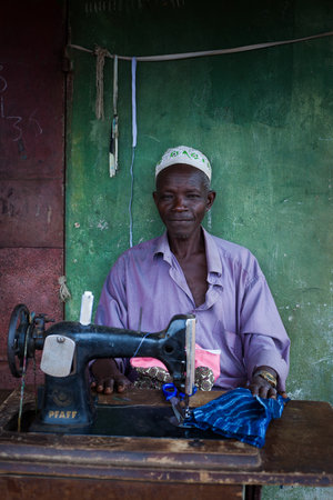 Yongoro, Sierra Leone - June 01, 2013: West Africa, the village of Yongoro in front of Freetown, the tailorのeditorial素材