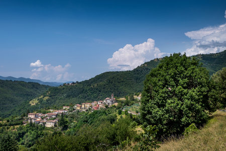 Garfagnana, Tuscany, Italy - ancient village of Ceserana view of the town with the medieval fortressの写真素材