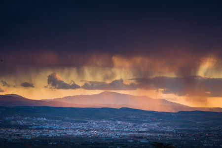 Granada, Spain - March 23, 2008 - view of Alhambra Palace in Granada, Spain with Sierra Nevada mountains at the backgroundのeditorial素材