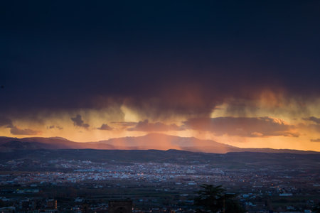 Granada, Spain - March 23, 2008 - view of Alhambra Palace in Granada, Spain with Sierra Nevada mountains at the backgroundのeditorial素材