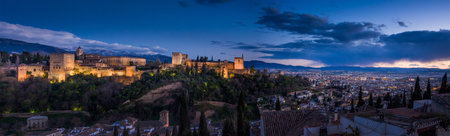 Granada, Spain - March 23, 2008 - view of Alhambra Palace in Granada, Spain with Sierra Nevada mountains at the backgroundのeditorial素材