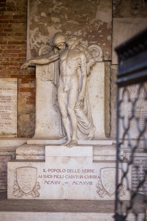 Serre di Rapolano are famous for being close to Rapolano headquarters of tourist spas with aqueous sulfuric, Cappella di Piazza e Serremaggio, memorial to the fallen of the warの写真素材