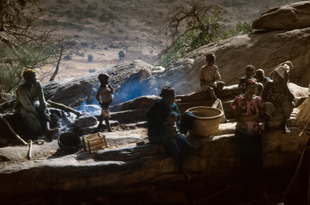 Gommo, Mali, Africa - January 26, 1992: Dogon village, typical mud buildings with animist temple and barns for cerealsのeditorial素材