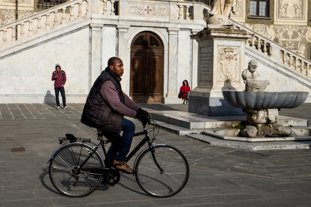Pisa, Italy - February 26, 2017: The Knights Square ( Piazza dei Cavalieri ) with Palazzo della Carovana and statue of Cosimo I de' Medici in the center of old town in Pisa, Italyのeditorial素材