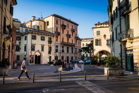 VERONA, Italy - April 04, 2017: tourists walk through the early morning Piazzetta Pescheriaのeditorial素材