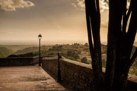 Montescudaio, Pisa, Tuscany, Italy, Panorama at sunset of the tower and Guardiola from the Castle Squareのeditorial素材