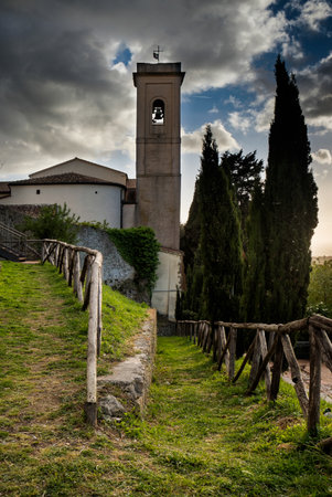 Montescudaio, Pisa, Tuscany, Italy, Panorama at sunset of the tower and church from the Castle Squareのeditorial素材