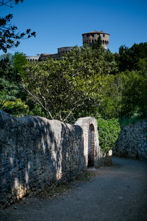 VOLTERRA, TUSCANY - MAY 21, 2017 - Medici fortress with the park in Volterra Tuscany Italyのeditorial素材