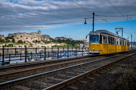 Budapest, capital of Hungary, the legendary tram two - circulates the Pest side of the Danube with a view of the Palace of Budapestのeditorial素材