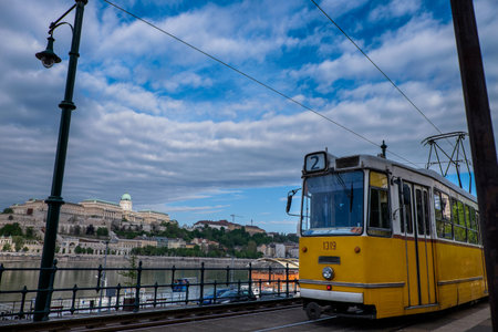 Budapest, capital of Hungary, the legendary tram two - circulates the Pest side of the Danube with a view of the Palace of Budapestのeditorial素材