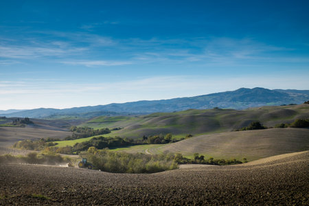 Volterra, Pisa, Italy - November 1, 2017: Hikers depart from Saline for the Volterra hills with panoramic views across the old railway, on background Montecatini Val di Cecinaのeditorial素材