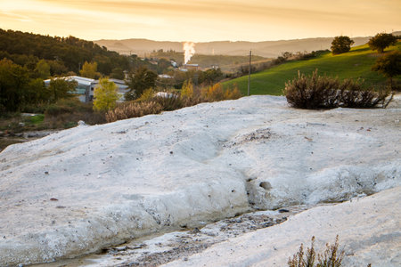 Volterra, Pisa, Italy - November 1, 2017: Hikers depart from Saline for the Volterra hills with panoramic views across the old railway, scraps of salt productionのeditorial素材
