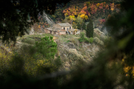 Chiusure, Siena, Tuscany - Novembre 12, 2017: Autumnal trekking in the province of Siena, from Buonconvento village along the Cassia Road, to the confluence of the rivers Arbia and Ombrone then along the historical Via Francigena and the village of Chiusuのeditorial素材