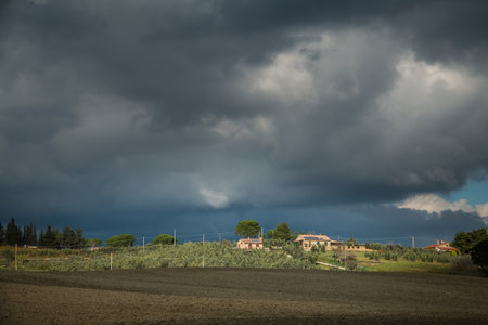 Casale Marittimo, Pisa, Italy - November 23, 2017: Trekking route towards the medieval village in Casale M.mo, in the Province of Pisa, along the beautiful views and hills typical of Tuscanyの写真素材