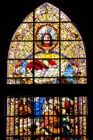 Seville, Andalusia, Spain - stained glass window inside of the Seville Cathedral of Saint Mary and is the third largest church in the worldのeditorial素材