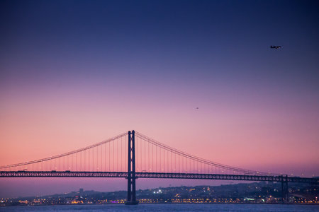 LISBON, PORTUGAL - February 01, 2011: The Tagus River past the 25 de Abril bridge from Cacilhas,...