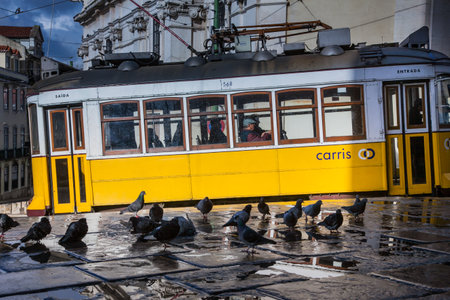 LISBON, PORTUGAL - January 28, 2011: A tram on the streets of the Alfama neighbourhood, the old quarter of Lisbon, Historical Province of Extremadura, Portugalのeditorial素材