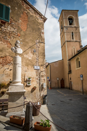 Campiglia Marittima, Province of Livorno in the Italian region Tuscany, located about 100 kilometers from Florence, the statue in memory of Giuseppe Garibaldi and the bell tower of the churchの写真素材