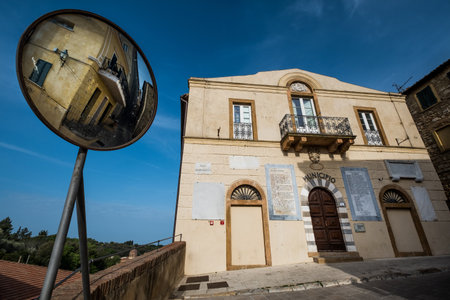 Bibbona, Leghorn, Italy - April 2018 the medieval village of Bibbona in Tuscany, the building of the municipality, the old seat of the city councilのeditorial素材