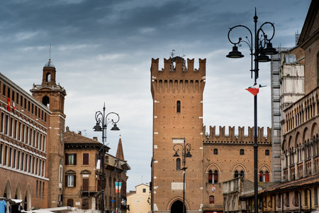 FERRARA, ITALY - Trieste and Trento square with Victoria tower and Clock tower, Ferrara,...