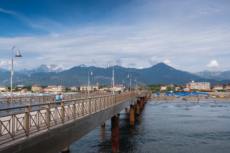 TONFANO, LUCCA, ITALY - AUGUST 13, 2018: The Tonfano pier is a work of the architect Tiziano Lera built in 2008, a seaside town with beaches by the seaのeditorial素材
