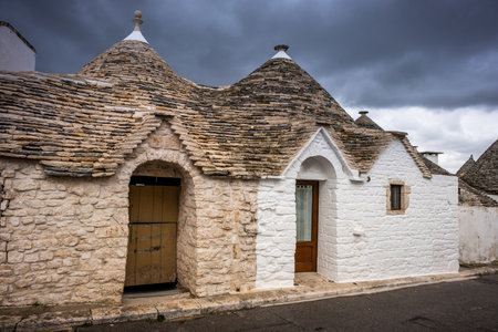 Trulli domes, traditional houses built with dry stone and conical roof, Alberobello,  Valle Itria, small town close to Bari district in Southern Italy, Puglia, Apulia, Italy, Europeの写真素材