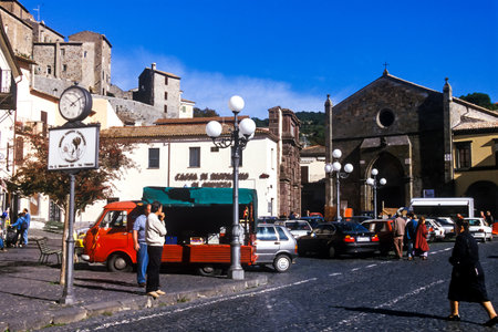 BOLSENA, ITALY - OCTOBER 21, 2001: Unknown people during market near the lLake of Bolsena (Italy) - The medieval town with castle on Lake Bolsena, region Latium, central Italyのeditorial素材