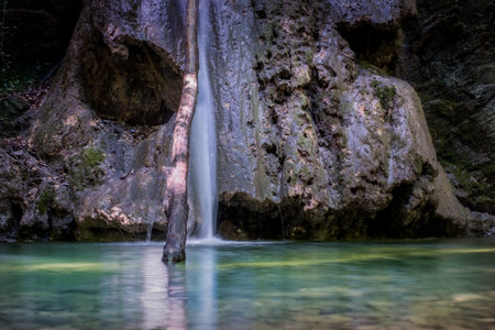 Trekking excursion in the cold and crystalline waters of the Ghiaccioni waterfall, Chianni in the municipality of Castellina Marittima, Pisa, Tuscanyの写真素材
