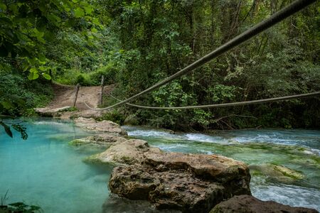 Alta Val dâElsa river park, the trail starts in Gracciano and reaches in Colle Val dâElsa (Siena, Tuscany) the river's waters are clear and of an intense turquoise color and are part of a protected natural areaの写真素材