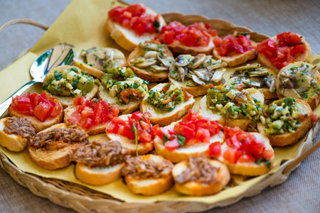 Processed foods for aperitifs, various kinds of croutons with mushroom tomatoes and meat compounds and preparations for tastingsの写真素材