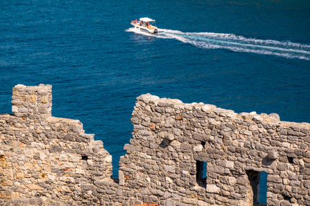 View from the Church of San Pietro (St. Peter consecrated in 1198) of the entrance by sea to Porto...