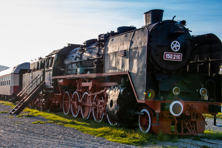 VISEUS DE SUS, ROMANIA - OCTOBER 10, 2014: Mocanita, a steam locomotive fueled by a wood fire, has...