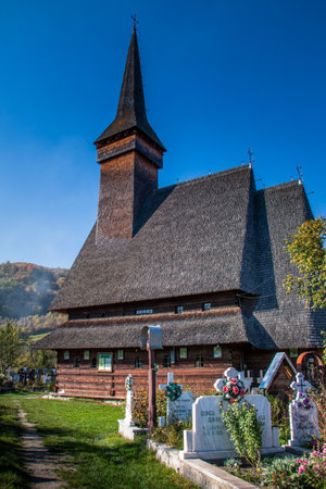 Maramures, the isolated Carpathian region of Romania. Wooden church of the Orthodox Church Cuvioasa Paraschiva, Poienile Izei, Maramures.  Romania, Europeの写真素材