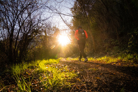 RIPAFRATTA, ITALY - JANUARY 06, 2020:  Unknown people during trekking in the medieval village of Ripafratta with the fortress of San Paolino stands on the banks of the Serchio river, in the municipality of San Giuliano Terme, Pisa, Tuscanyのeditorial素材