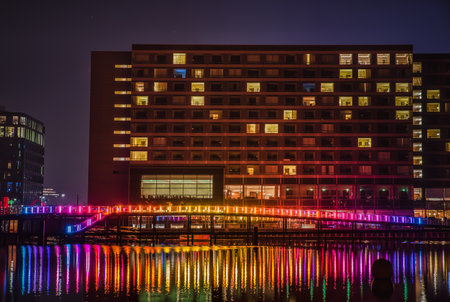 Copenhagen, Denmark - February 24, 2019

The Eternal Sundown reflecting a colorful scenery from sunset to dawn on the city 's canal 's water and along with its modern buildings conveys a sense of calmのeditorial素材